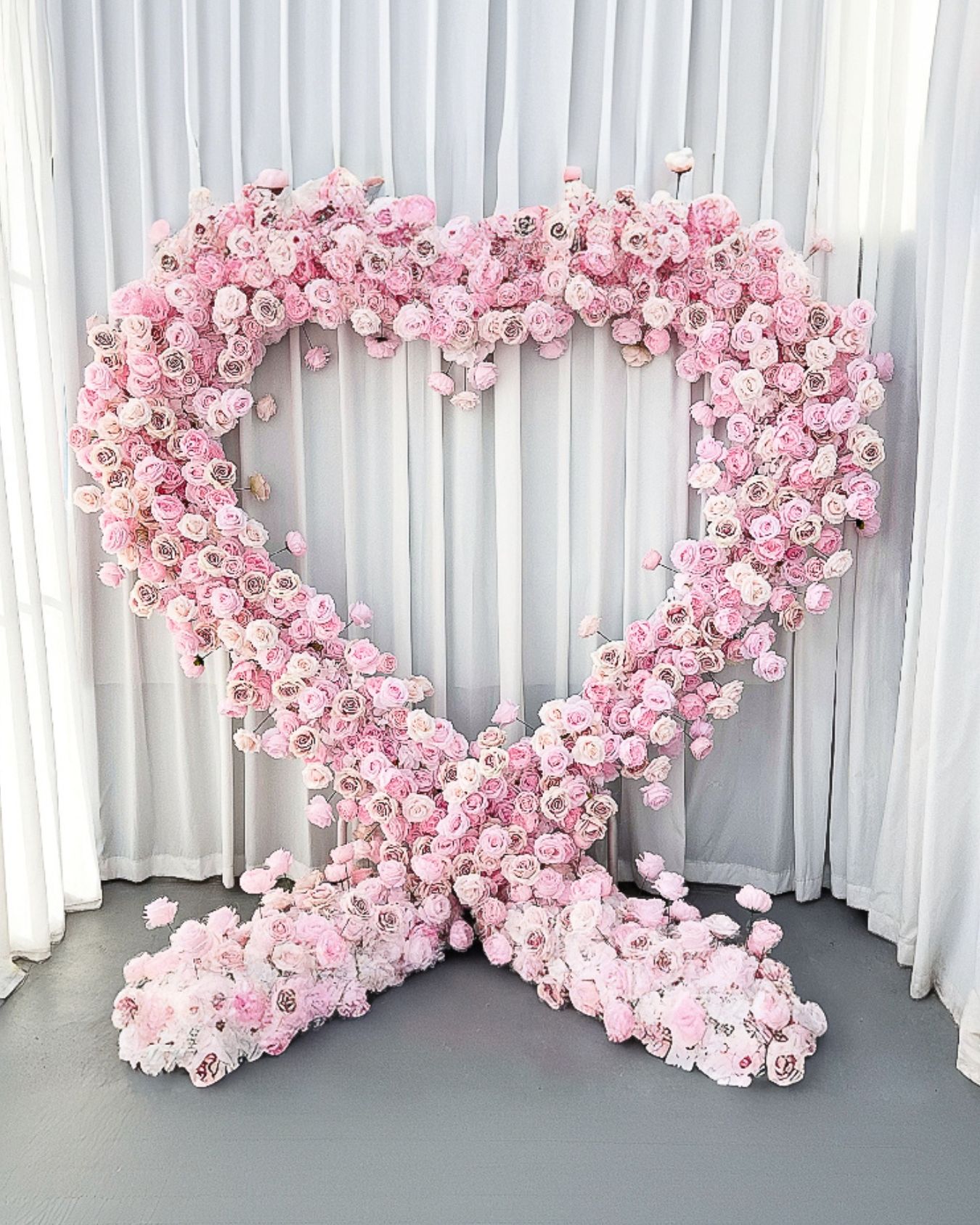 Pink rose floral heart arch proposal setup, The Classic Heart by La La Events in Houston
